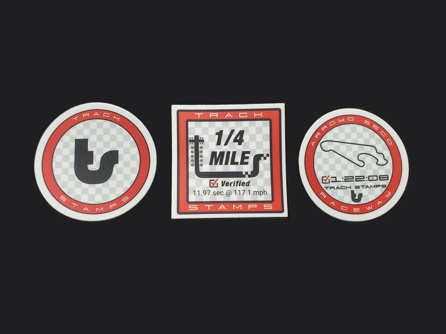 Three racing-themed stickers on a black background
